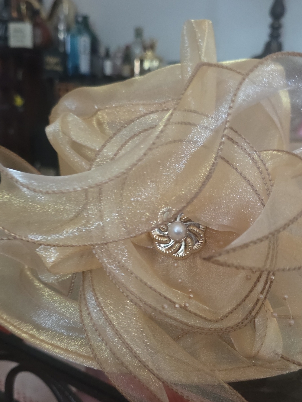 Elegant Women's Gold Organza Dress Hat with Floral Accent - Picture 6 of 6